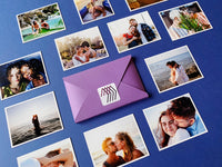 Custom square photo magnets showing couples and family moments, arranged on a blue background with a Magnetic Love envelope in the center.