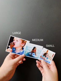Three custom photo magnets held in hand, comparing the small, medium, and large sizes available at Magnetic Love.