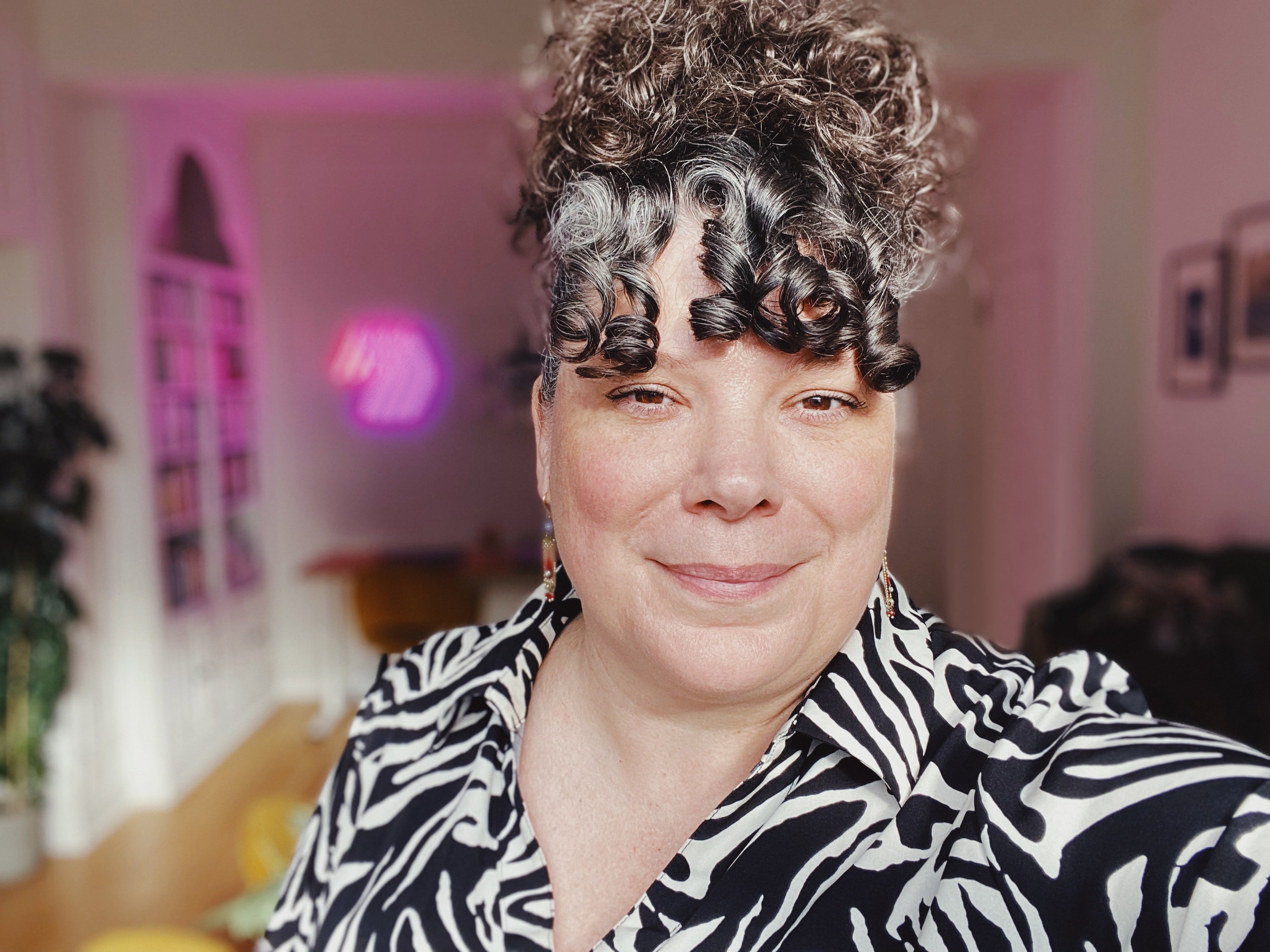 Annie Bérubé, founder of Magnetic Love, in her creative studio where handmade custom photo magnets are designed and packaged.