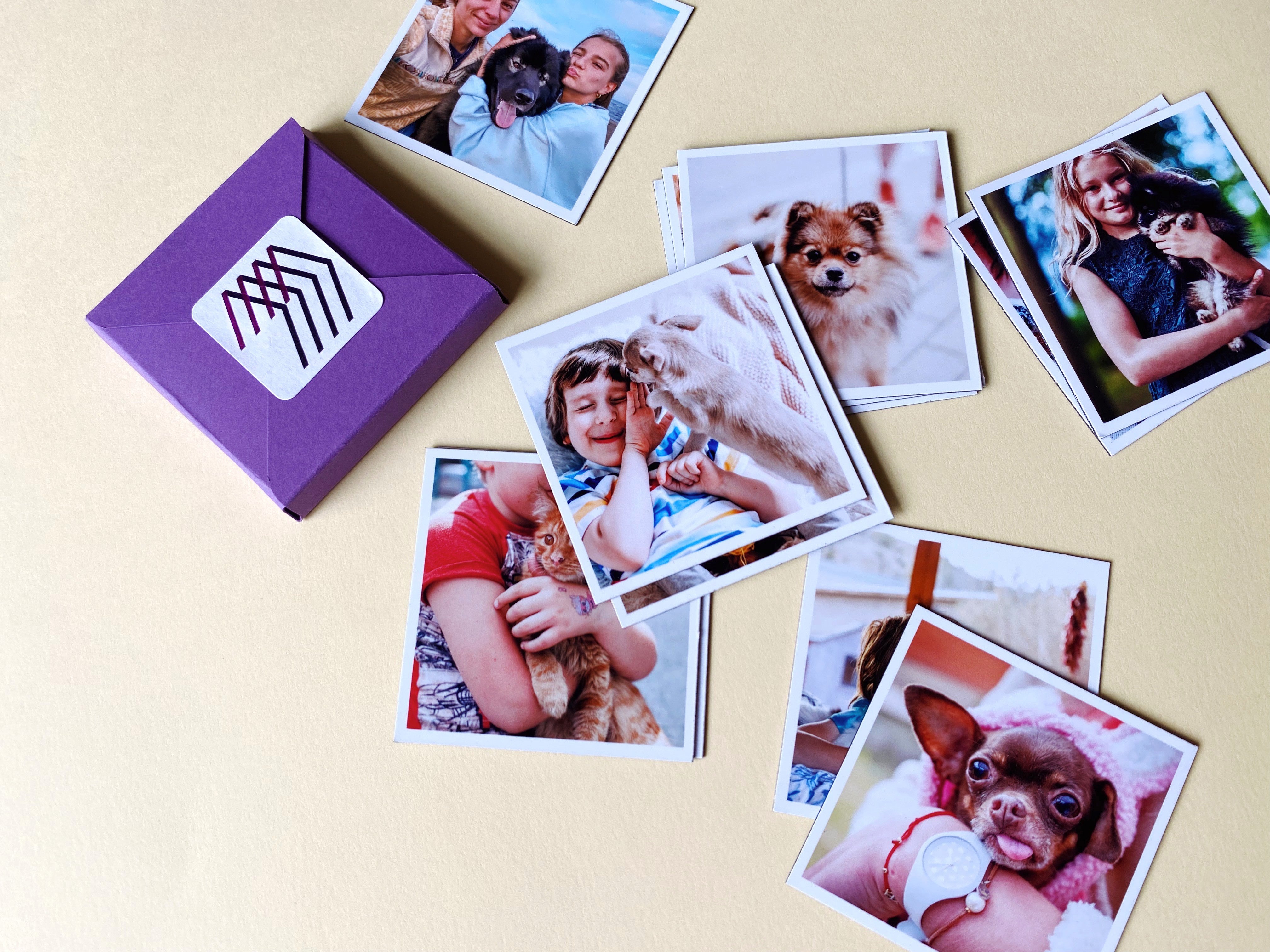 Handmade custom photo magnets by Magnetic Love, featuring pets and children’s memories beside a purple gift box – homepage banner image.