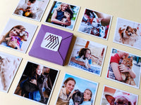 Square custom photo magnets arranged around a Magnetic Love envelope, showing family and pet memories.